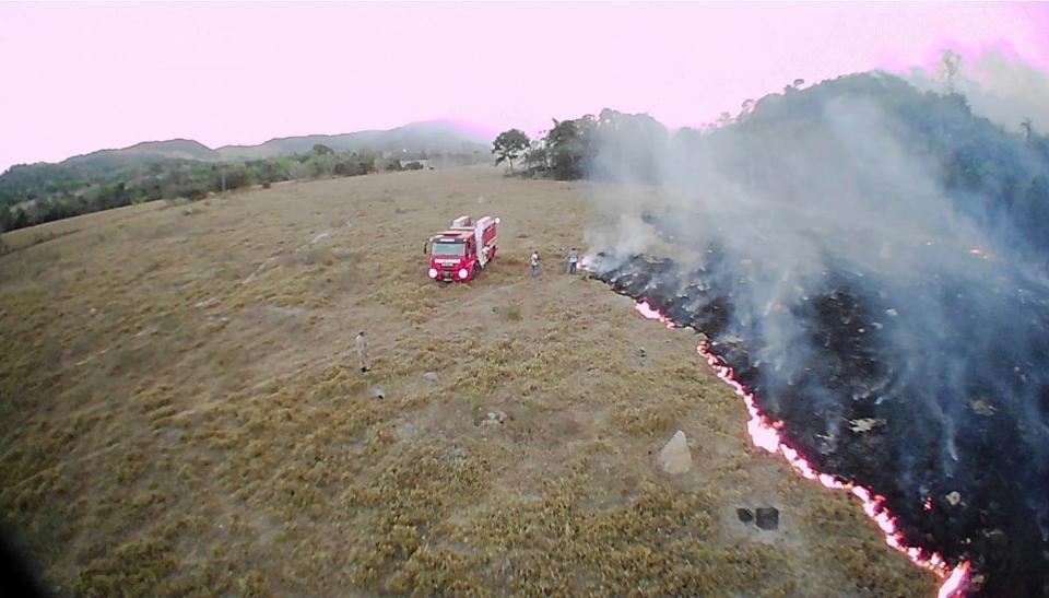 In this Aug. 20, 2019, drone photo released by the Corpo de Bombeiros de Mato Grosso, brush fires burn in Guaranta do Norte municipality, Mato Grosso state, Brazil. Brazil's National Institute for Space Research, a federal agency monitoring deforestation and wildfires, said the country has seen a record number of wildfires this year.