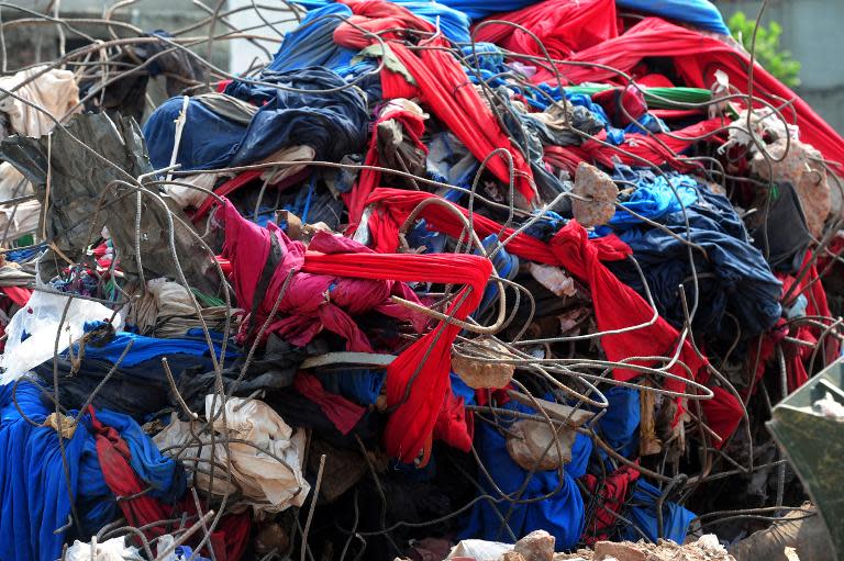 Finished garments are seen after they were retrieved from the rubble following the collapse of the Rana Plaza industrial building in Savar, on the outskirts of Dhaka, on May 4, 2013