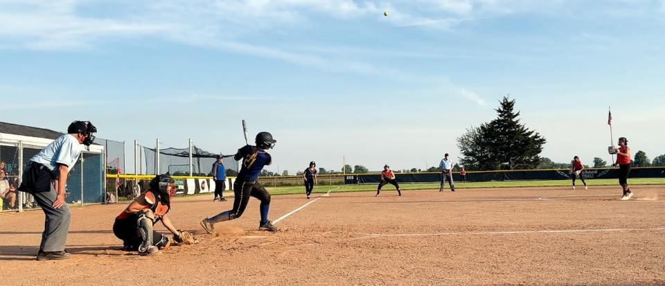 Ida's Summer Smith launches a home run Tuesday against Hudson.