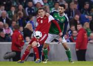 Football Soccer - Northern Ireland v Belarus - International Friendly - Windsor Park, Belfast, Northern Ireland - 27/5/16 Northern Ireland's Conor McLaughlin and Belarus' Mikhail Gordejchuk Reuters / Clodagh Kilcoyne