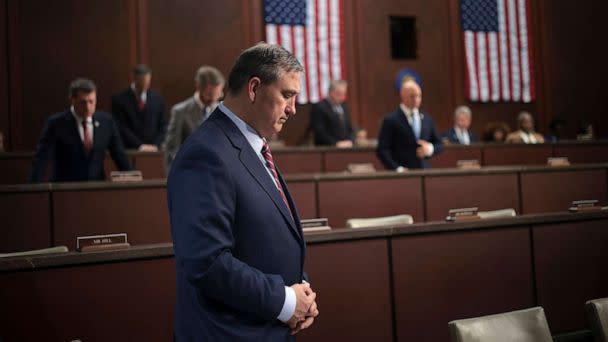 PHOTO: Members of the the House Foreign Affairs Committee stand in silence in memory of the 13 members of the U.S. military who were killed while defending an attack on airport in Afghanistan at the U.S. Capitol on March 8, 2023 in Washington, D.C. (Win McNamee/Getty Images)