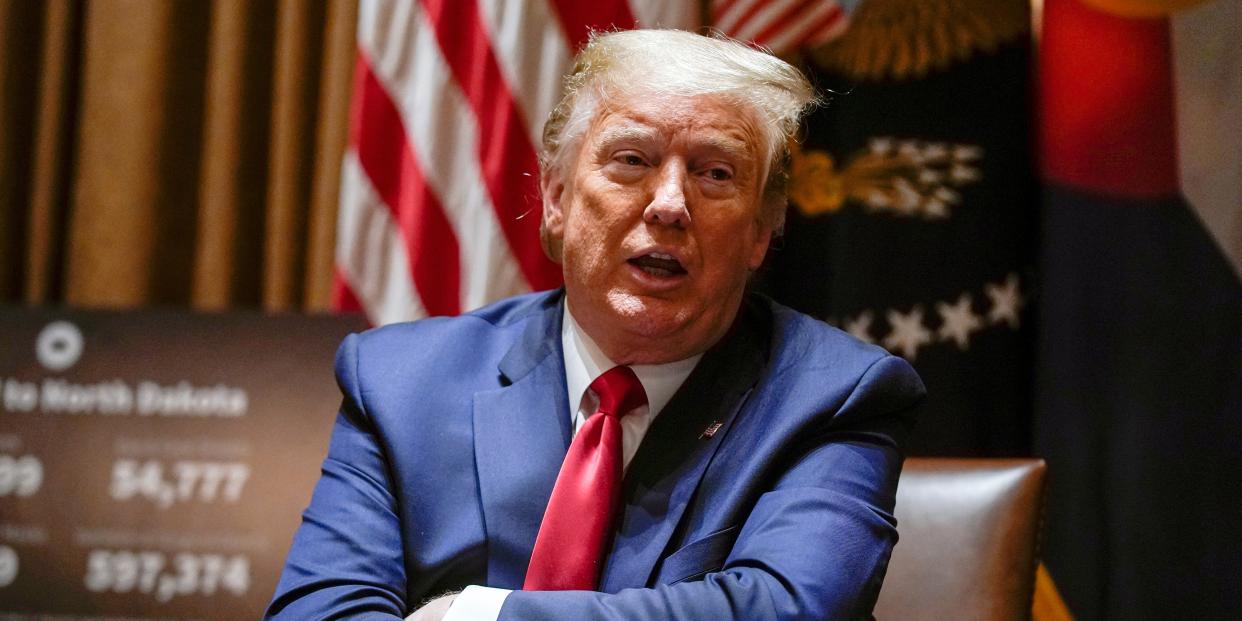 President Donald Trump speaks during a meeting with North Dakota Gov. Doug Burgum, and Colorado Gov. Jared Polis, in the Cabinet Room of the White House, Wednesday, May 13, 2020, in Washington. (AP Photo/Evan Vucci)