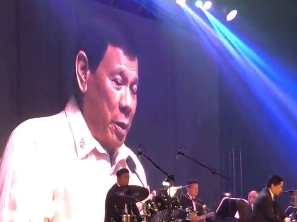 President Duterte sings a duet at the ASEAN gala dinner: @AttyKarenJimeno/Twitter
