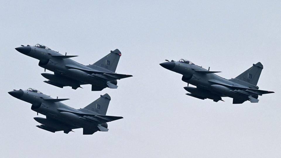 Pakistan Air Force J-10C fighter jets perform at a rehearsal ahead of Pakistan's national day parade in Islamabad on March 21, 2024. (Aamir Qureshi/AFP via Getty Images)