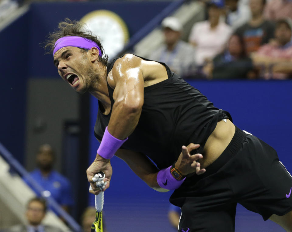 Rafael Nadal, of Spain, serves to Marin Cilic, of Croatia, during the fourth round of the U.S. Open tennis tournament Monday, Sept. 2, 2019, in New York. (AP Photo/Seth Wenig)