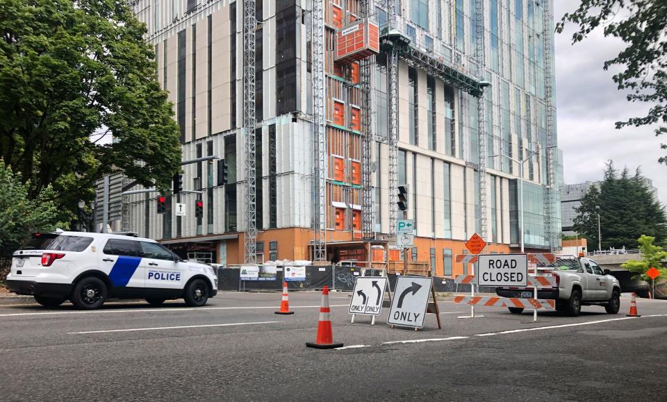 A road closure sign is seen in downtown Portland, Ore., Friday, Aug. 16, 2019, in advance of a rally as the city prepares for crowds. In the past week, authorities in Portland have arrested a half-dozen members of right-wing groups on charges related to violence at previous politically motivated rallies as the liberal city braces for potential clashes between far-right groups and self-described anti-fascists who violently oppose them.