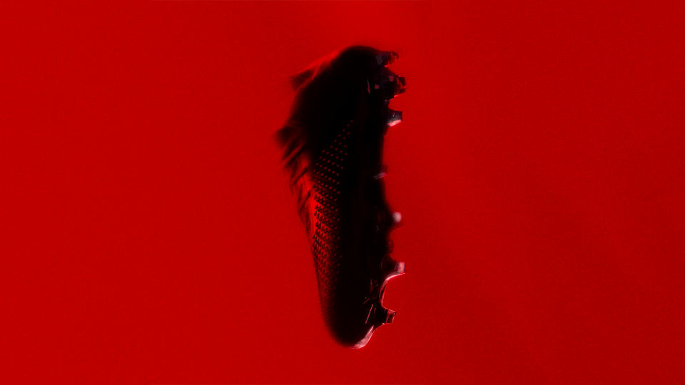 The Adidas and Prada Predator Accuracy soccer shoes.