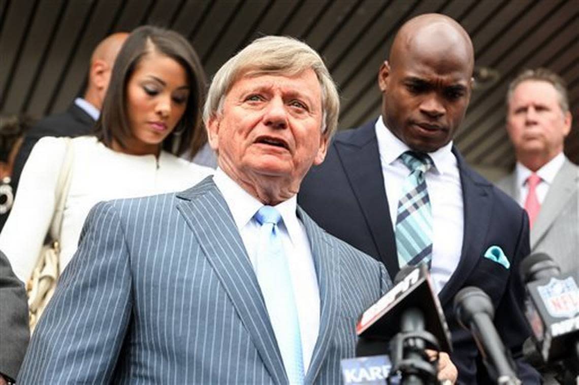 Attorney Rusty Hardin speaks to the media after Minnesota Vikings running back Adrian Peterson, right, pleaded no contest to an assault charge Tuesday, Nov. 4, 2014, in Conroe, Texas. Adrian Peterson avoided jail time on Tuesday in a plea agreement reached with prosecutors to resolve his child abuse case. (AP Photo/ The Courier, Michael Minasi) Michael Minasi/AP/Conroe Courier