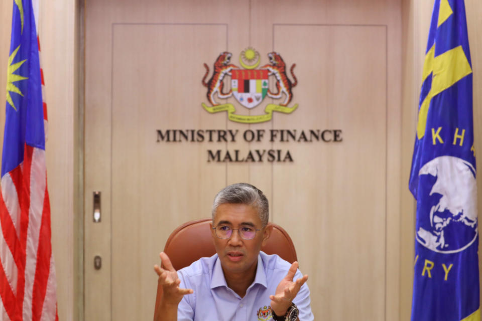 Finance Minister Datuk Seri Tengku Zafrul speaks during an interview with Reuters in Putrajaya, April 5, 2021. — Reuters pic