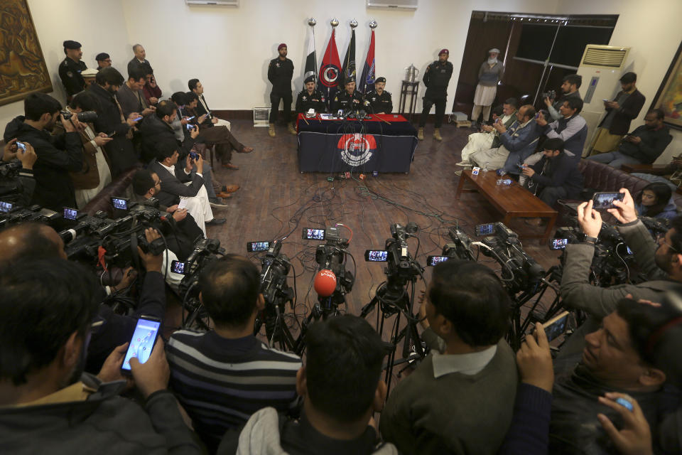 Pakistan's Khyber Pakhtunkhwa provincial police chief Moazzam Jan Ansari, top center, speaks during a press conference regarding the investigation of Monday's suicide bombing, in Peshawar, Pakistan, Feb. 2, 2023. A suicide bomber who killed 101 people at a mosque in northwest Pakistan this week had disguised himself in a police uniform and did not raise suspicion among guards, the provincial police chief said on Thursday. (AP Photo/Muhammad Sajjad)