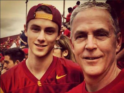 Parents weekend, college, father and son, sports game