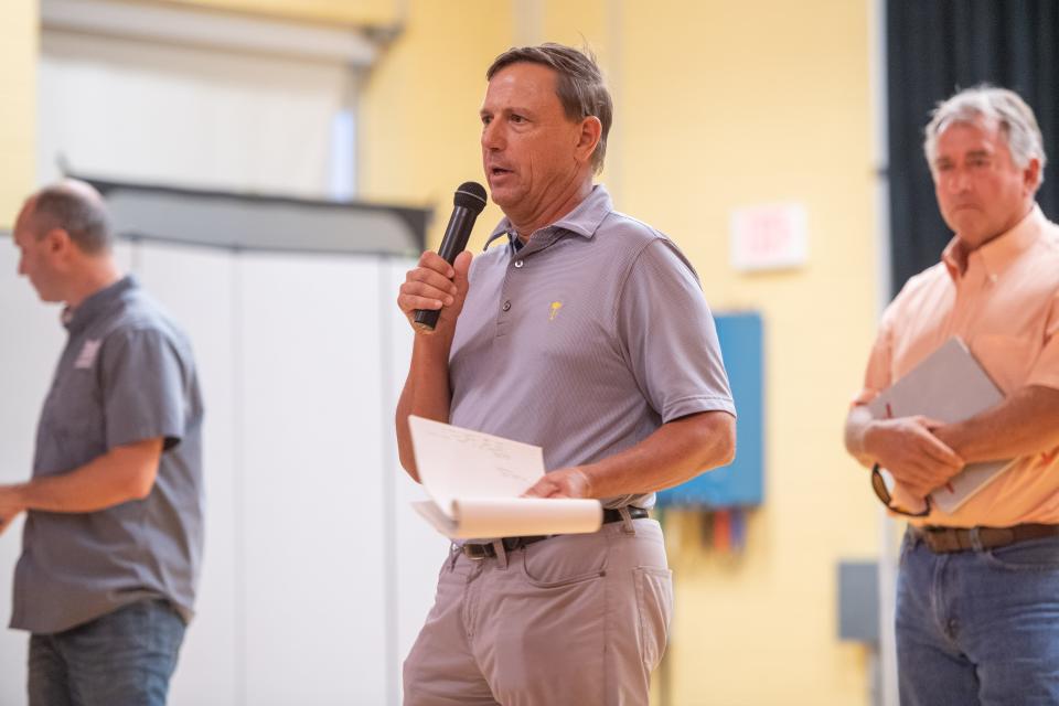 Michael Bennett of Commonwealth Golf Partners speaks to the community about upcoming changes to the Asheville Municipal Golf Course on September 1, 2022.