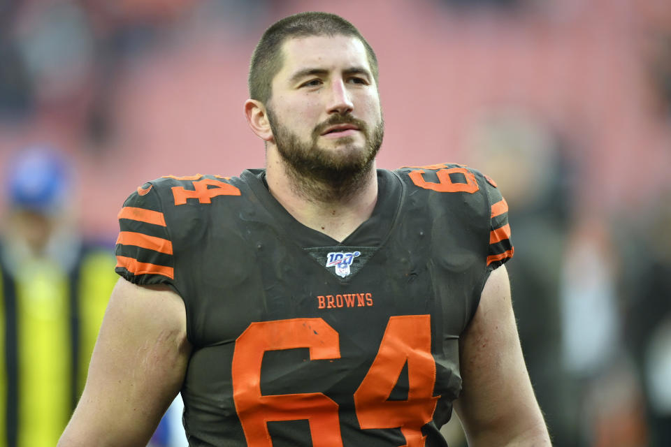 FILE - In this Dec. 8, 2019, file photo, Cleveland Browns center JC Tretter walks off the field after an NFL football game against the Cincinnati Bengals in Cleveland. NFLPA president JC Tretter warned players they have to "fight for necessary COVID-19 protections" and Malcolm Jenkins said "football is nonessential." With training camp less than a month away, some players are speaking out about concerns over playing football during a pandemic while others are ignoring medical advice and holding workouts with teammates. (AP Photo/David Richard, File)
