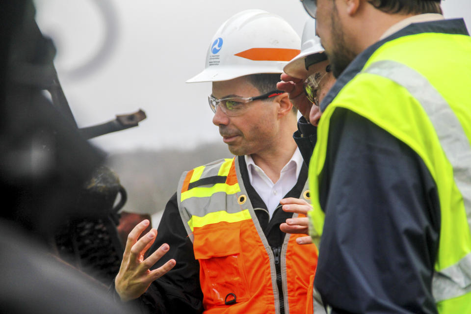 Transportation Secretary Pete Buttigieg tours the site of the Feb. 3, Norfolk Southern train derailment, Thursday, Feb. 23, 2023, in East Palestine, Ohio. (Allie Vugrincic/The Vindicator via AP, Pool)