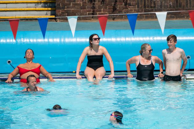 Swimmers soak up the sun at Charlton Lido in south east London. (Photo: Dominic Lipinski - PA Images via Getty Images)