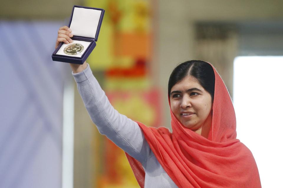 Nobel Peace Prize laureate Yousafzai poses with her medal during the Nobel Peace Prize awards ceremony at the City Hall in Oslo