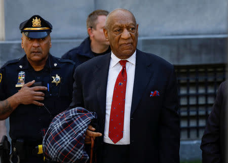 Actor and comedian Bill Cosby exits the Montgomery County Courthouse after a jury convicted him in a sexual assault retrial in Norristown, Pennsylvania, U.S., April 26, 2018. REUTERS/Brendan McDermid