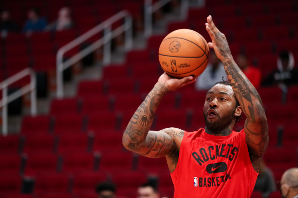 HOUSTON, TEXAS - NOVEMBER 24: John Wall #1 of the Houston Rockets takes practice at Toyota Center on November 24, 2021 in Houston, Texas. NOTE TO USER: User expressly acknowledges and agrees that, by downloading and or using this photograph, User is consenting to the terms and conditions of the Getty Images License Agreement. (Photo by Carmen Mandato/Getty Images)