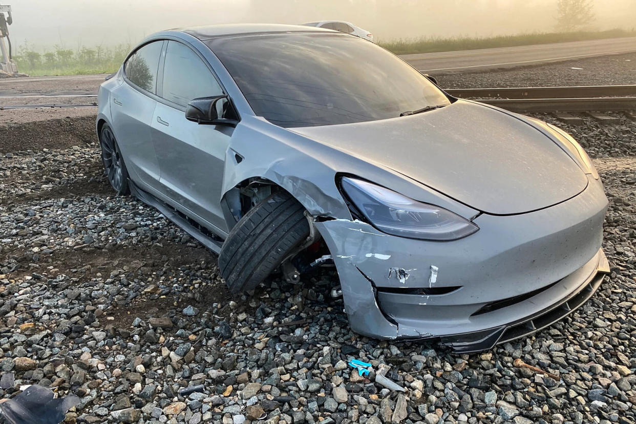 A Tesla with a damaged bumper and front right wheel. (Courtesy Craig Doty II)