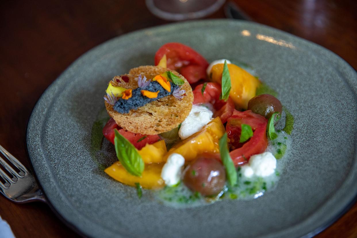 Heirloom tomato salad at Summit House made by AJ Capella.