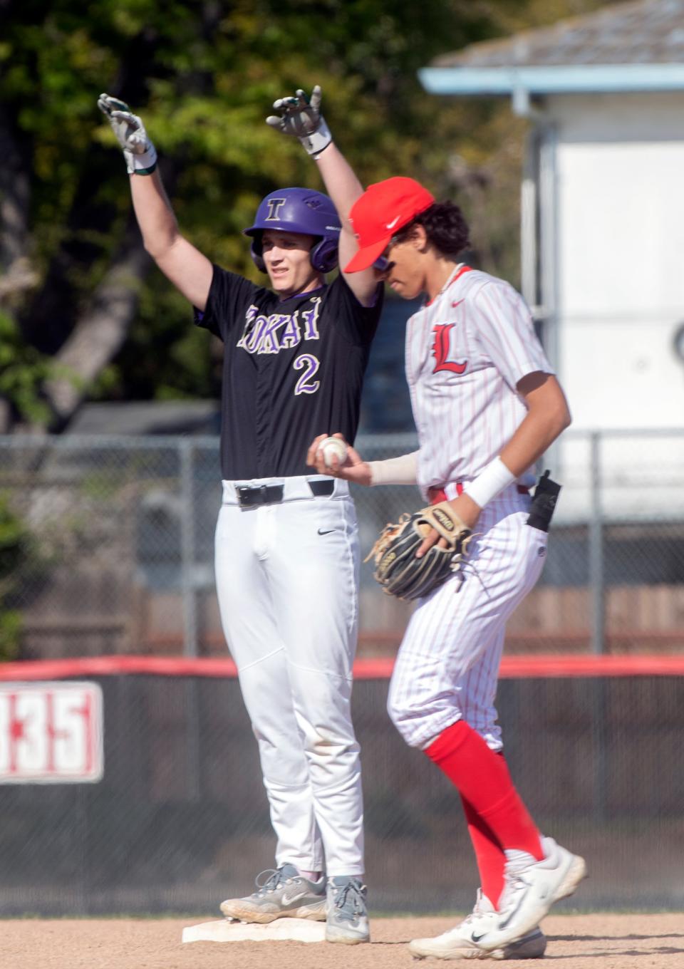 Tokay's Brett Graddy celebrates hitting a double during a varsity baseball game at Lincoln in Stockton on Wednesday, Apr.19, 2023.