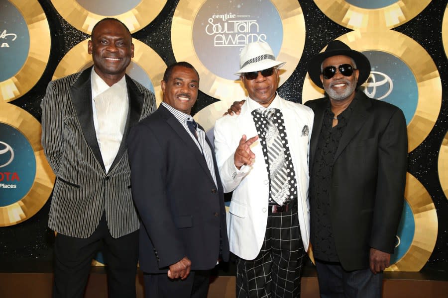 FILE – George Brown, from left, Ronald Bell, Dennis Thomas and Robert “Kool” Bell, of Kool and the Gang, appear at the 2014 Soul Train Awards in Las Vegas on Nov. 7, 2014. Brown died Nov. 16, 2023 in Los Angeles, after a battle with cancer. Ronald Bell died in 2020 and Dennis Thomas died in 2021. The group is among the 2024 nominees for induction into the Rock & Roll Hall of Fame. (Photo by Omar Vega/Invision/AP, File)