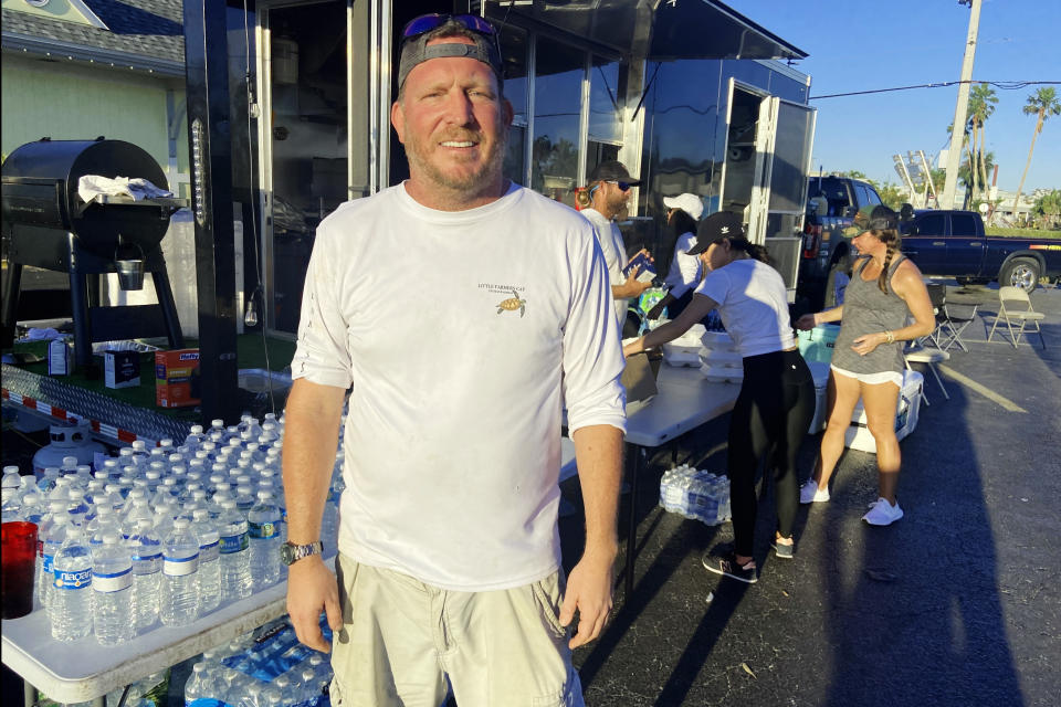 Chef Fritz Caraher of Fort Myers, Fla., has been feeding survivors of Hurricane Ian for free in a shopping center parking lot since almost immediately after the storm. 