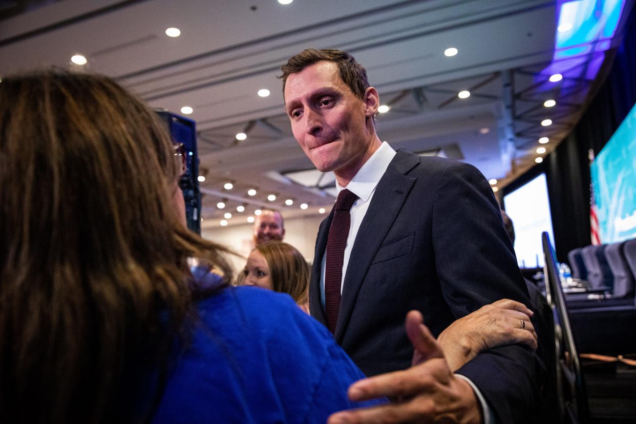 Blake Masters stops to chat with his supporters at the end of the Republican primary debate for the U.S Senate in Phoenix on June 23, 2022.