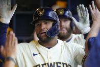 Milwaukee Brewers' Jackson Chourio is congratulated after hitting a two-run home run during the sixth inning of a baseball game against the Pittsburgh Pirates Wednesday, May 15, 2024, in Milwaukee. (AP Photo/Morry Gash)