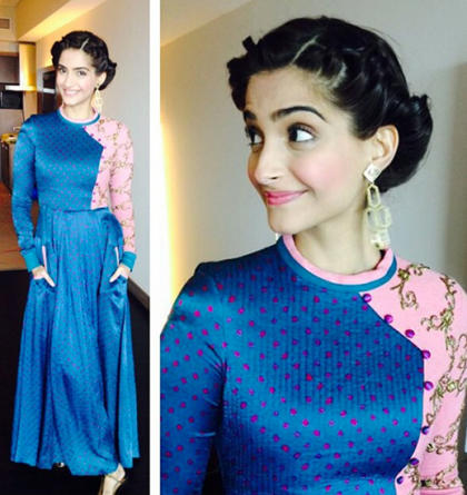 Crown twists with a low chignon was the look of the day.Image:Instagram.com/Sonamkapoor