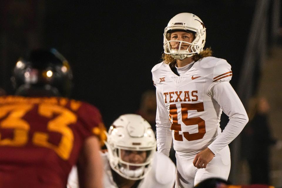 Texas kicker Bert Auburn lines up an extra-point attempt during Saturday night's 26-16 win over Iowa State. Auburn has made 14 straight field-goal tries and 98 consecutive extra points, the second longest streak in program history.
