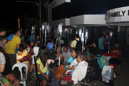 Confined patients of Miranda Family hospital stay outside after an earthquake hit Surigao city, southern Philippines February 10, 2017. Picture taken February 10, 2017. REUTERS/Roel Catoto-Mindanews