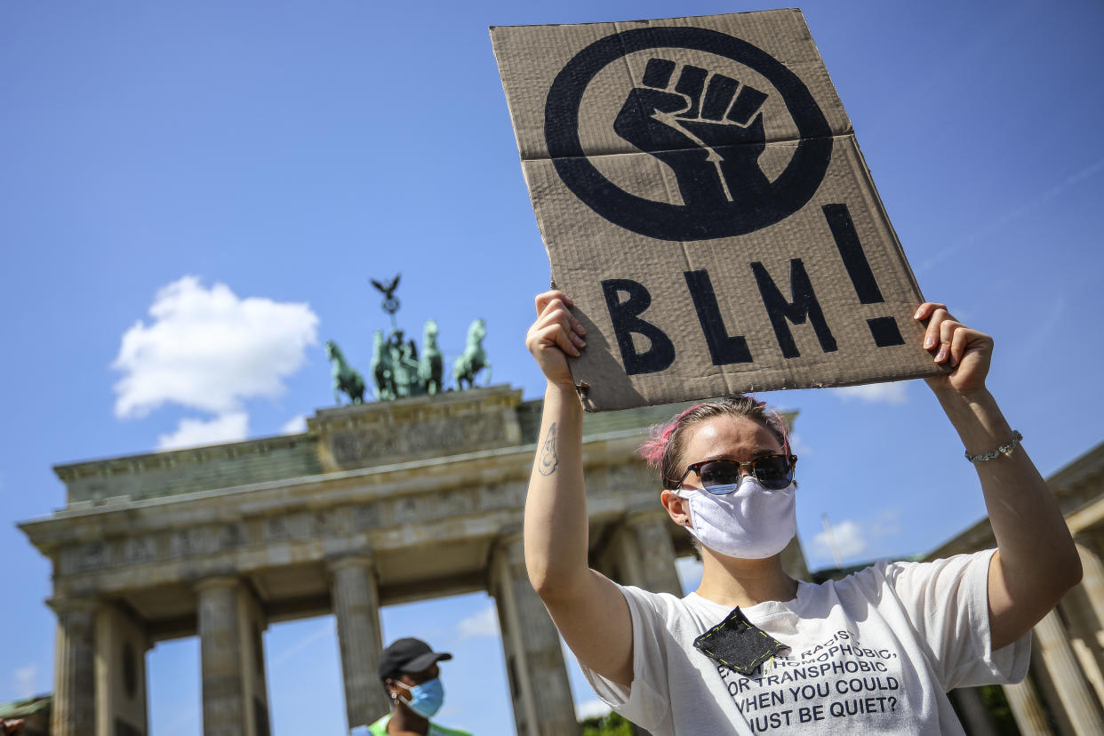 People demonstrate in commemoration of George Floyd near the American embassy at Pariser Platz in Berlin, Germany, May 31, 2020. About 200 people gathered in front of the Brandenburg Gate in the German capital to protest against police brutality racism and hate. 46-year-old African-American, George Floyd died on May 25, 2020 after a Minneapolis police officer was kneeling on his neck for several minutes during his arrest. The controversial act of police brutality sparked violent demonstrations throughout the U.S with reports of riots in Minnesota, California, New-York and more. Reports also mention that Derek Chauvin, one of the police officers allegedly involved in the incident was arrested and will be charged with Third-degree murder. (Photo by: Omer Messinger)