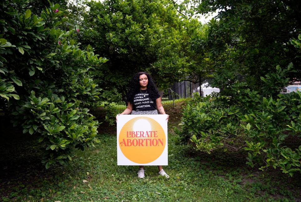 Jun 26, 2022; Columbus, OH, USA; Jordyn Close, who is on the board chair of Women Have Options/Ohio and the executive fellow at Ohio Women's Alliance, poses for a portrait in Goodale Park in Columbus, Ohio. Close co-hosted the Women Have Options/Ohio "speak out" at ComFest where people were able to share their experience of having an abortion in a supportive group setting. Mandatory Credit: Brooke LaValley-The Columbus Dispatch