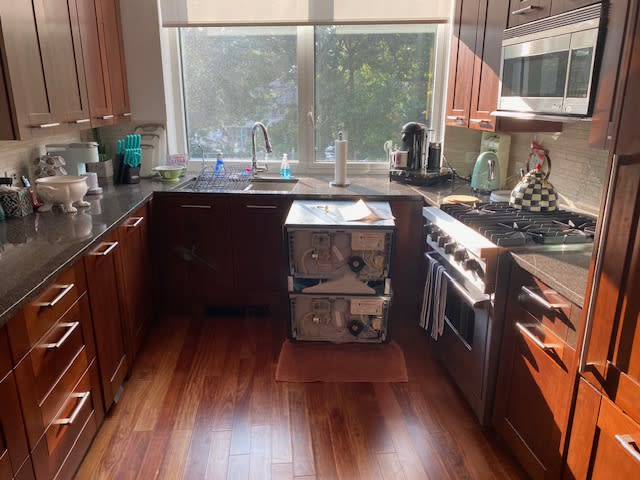 Among the issues in this now-for-sale flat: a leaky dishwasher that made the floor buckle. Julie Hyman