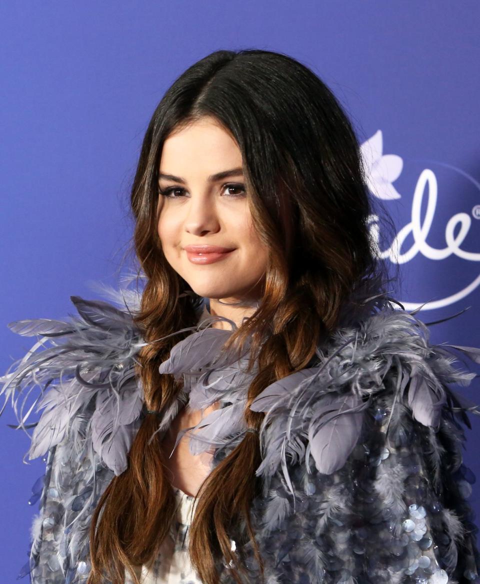 <p>Selena gave her lived-in beach waves a styled touch with easy loose braids. Take it from the best, it's a great way to get use out of day-three hair.</p>
