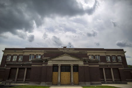 The entrance to Francis Parkman School is boarded up in Chicago, Illinois, May 8, 2015. REUTERS/Jim Young