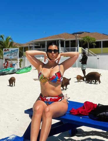 <p>Kourtney Kardashian/instagram</p> Kourtney Kardashian poses in a vibrant bikini on 45th birthday trip