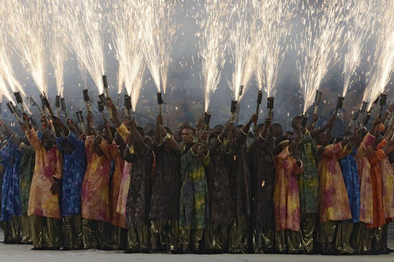 Dancers perform during a ceremony held ahead of the kick off of the 2013 African Cup of Nations final football match between Burkina Faso and Nigeria on February 10, 2013 at Soccer City stadium in Johannesburg