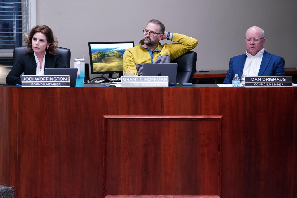 City of Wyoming council members Jodi Woffington, Grant T. Hoffman and Dan Driehaus listen to remarks by Hamilton County Juvenile Court Adminstrator Liz Igoe, Monday, March 18, 2024.