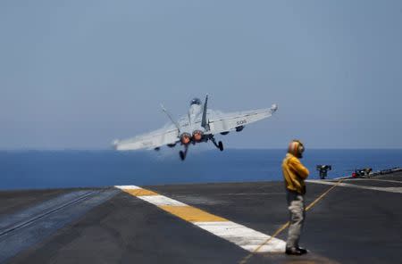 F/A-18 fighter jet takes off from the USS Harry S. Truman aircraft carrier in the eastern Mediterranean Sea June 13, 2016. REUTERS/Baz Ratner