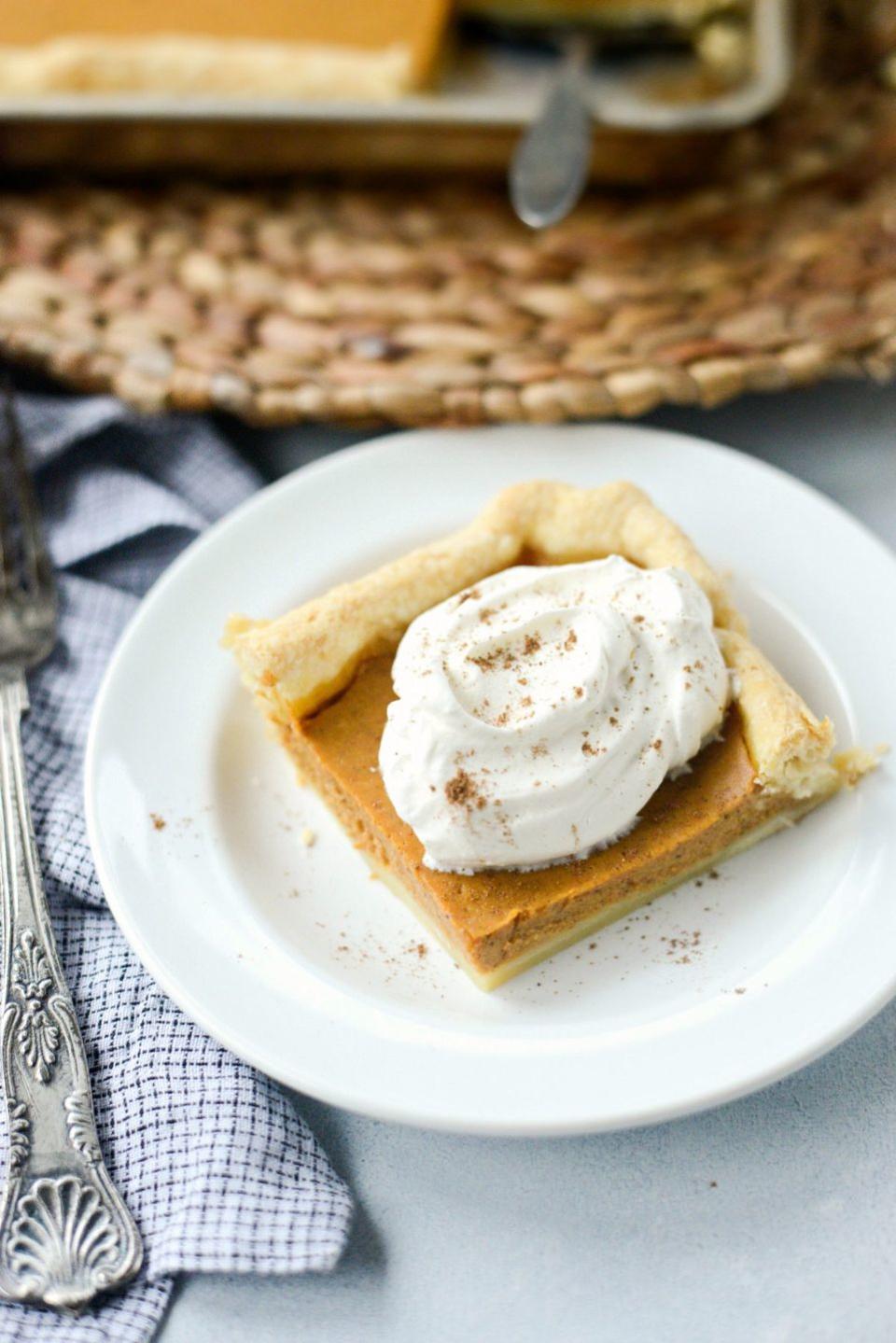 <p>This pumpkin slab pie is a great idea if you're feeding a crowd on Thanksgiving.</p><p><strong>Get the recipe at <a href="https://www.simplyscratch.com/2018/11/pumpkin-slab-pie.html" rel="nofollow noopener" target="_blank" data-ylk="slk:Simply Scratch;elm:context_link;itc:0;sec:content-canvas" class="link ">Simply Scratch</a>.</strong></p><p><strong><a class="link " href="https://go.redirectingat.com?id=74968X1596630&url=https%3A%2F%2Fwww.walmart.com%2Fsearch%2F%3Fquery%3Dpie%2Bserver&sref=https%3A%2F%2Fwww.thepioneerwoman.com%2Ffood-cooking%2Fmeals-menus%2Fg33565118%2Fpumpkin-dessert-recipes%2F" rel="nofollow noopener" target="_blank" data-ylk="slk:SHOP PIE SERVERS;elm:context_link;itc:0;sec:content-canvas">SHOP PIE SERVERS</a></strong></p>