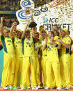 The Aussies hoist the World Cup trophy.