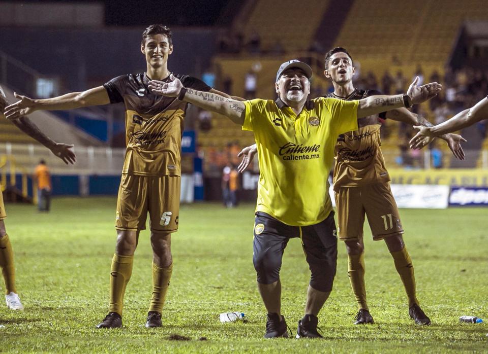 Diego Maradona reacts during a match against Universidad de Guadalajara (AFP/Getty)