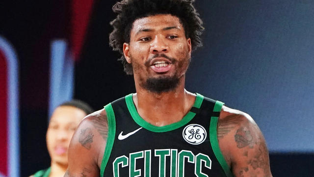 Marcus Smart of the Boston Celtics speaks to Malika Andrews of