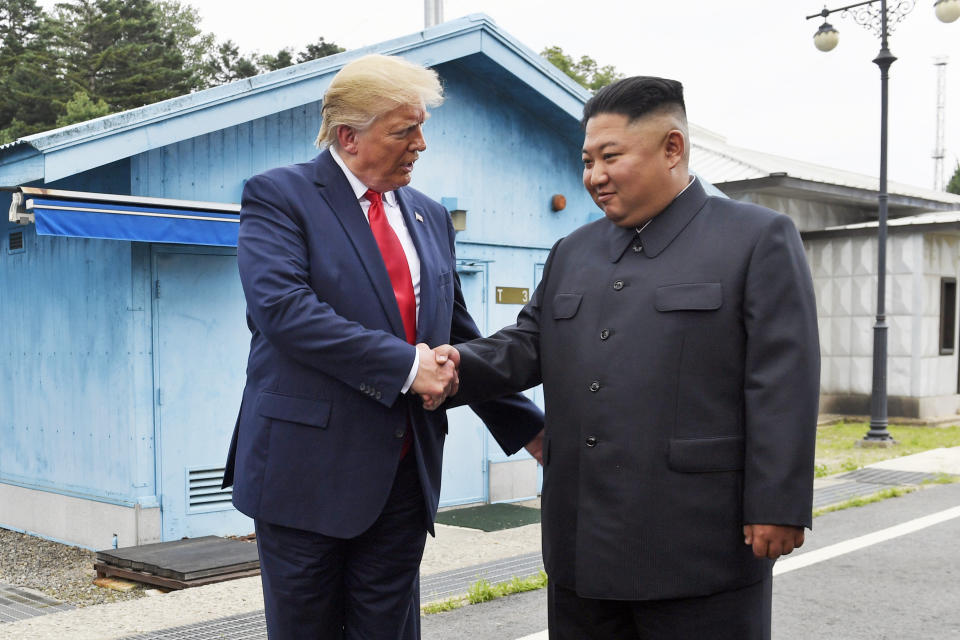 FILE - In this June 30, 2019, file photo, President Donald Trump shakes hands with North Korean leader Kim Jong Un at the border village of Panmunjom in the Demilitarized Zone, South Korea. There will be leaders and populations who shudder at the thought of four more years of the Donald Trump administration and those whose consternation is tied to his potential defeat, and a U.S. government led by a President Joe Biden. Trump had hoped his jaw dropping outreach to North Korea's Kim Jong Un would be his signature foreign policy legacy. (AP Photo/Susan Walsh, File)