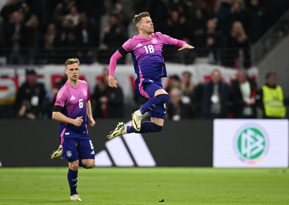 Max Mittelstädt (right) celebrates his equaliser against Netherlands (Getty Images)