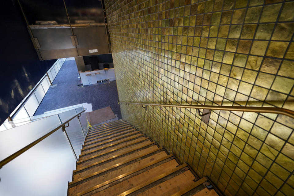 Hand-cut glass tile line the main staircase in the newly renovated David Geffen Hall, Thursday, Aug. 25, 2022, at the Lincoln Center for the Performing Arts in New York. Geffen Hall opens Oct. 8 following a $550 million renovation with the orchestra’s first concert there since March 10, 2020, the final performance before the pandemic shutdown. (AP Photo/Mary Altaffer)