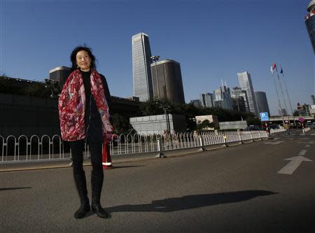 U.S. producer Janet Yang poses during an interview with Reuters in Beijing October 19, 2013. REUTERS/Kim Kyung-Hoon