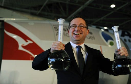 Qantas chief executive Alan Joyce poses during a press conference at Sydney Airport ahead of Australia's first flight powered by sustainable aviation fuel on April 13, 2012
